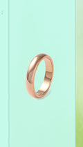 Shop the 4mm Rose Gold Studio Ring at Bloom Gloss Co. This classic minimalist domed band features a high-polish mirror finish, perfect for daily wear.