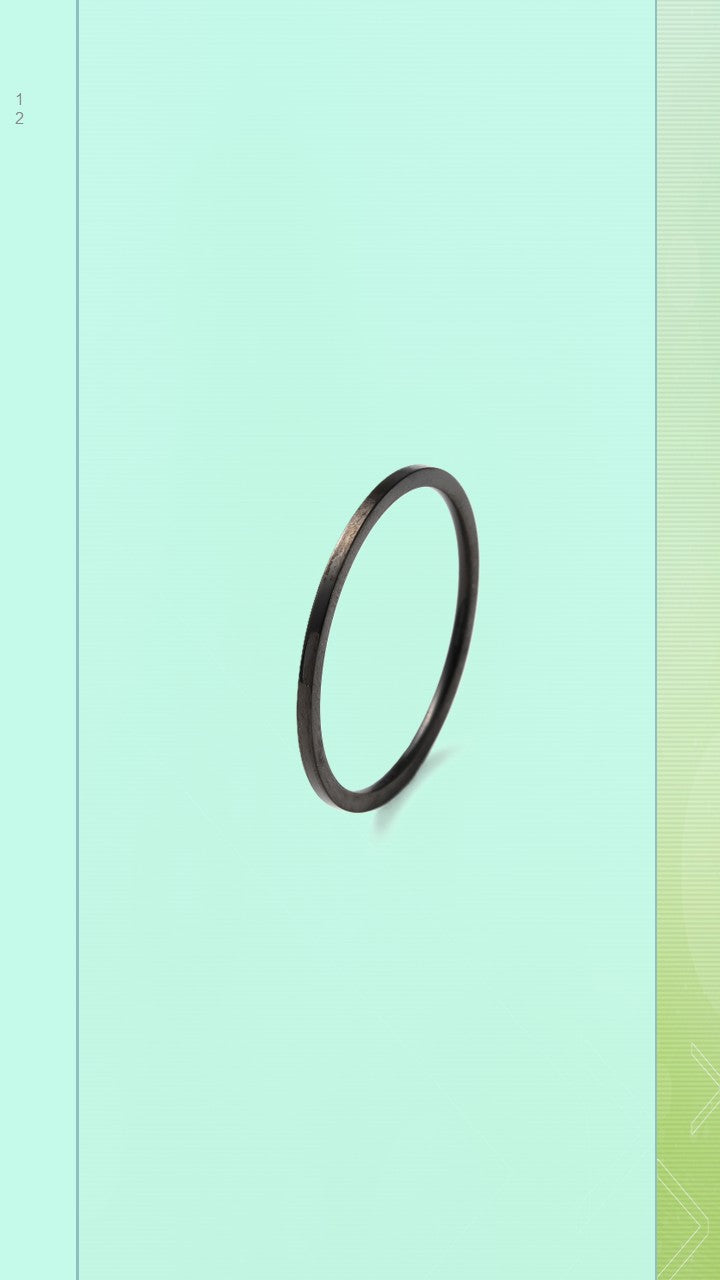 Shop the Pure Band at Bloom Gloss Co. This ultra-thin 1mm minimalist black ring features a sleek flat edge design, perfect for bold everyday stacking.