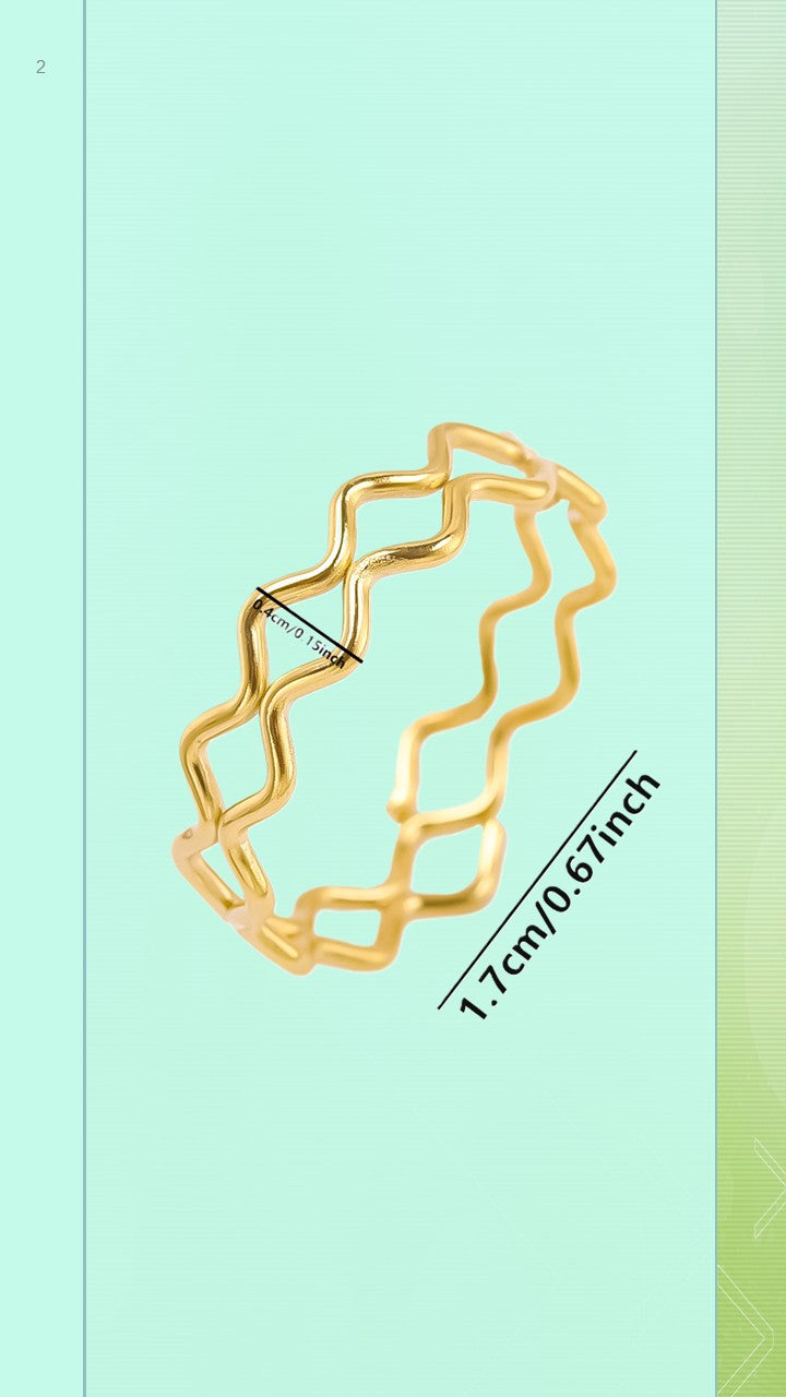 The Ripple Ring by Bloom Gloss Co: a minimalist 18K gold plated stackable band with a continuous wavy zigzag geometric pattern, featuring digital alignment grid lines and the label Bloom Gloss Co on a light mint green background.